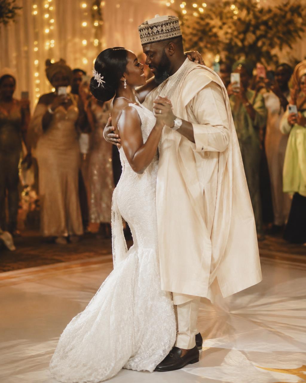 Nigerian couple sharing their first dance as guests film